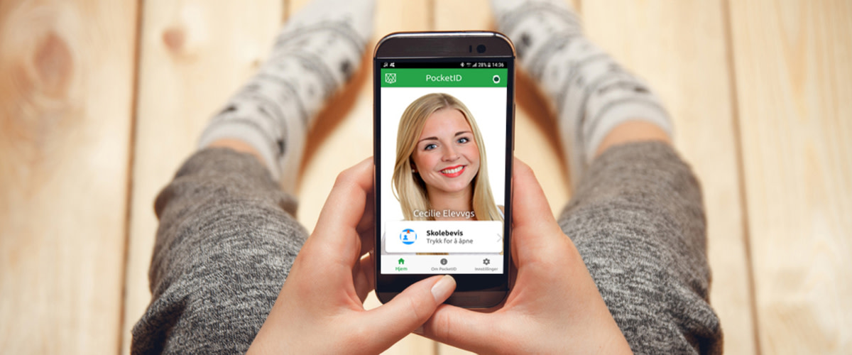 Mobiltelefon med PocketID-app åpen på skjermen